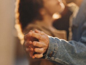 Couple dancing with their hands together