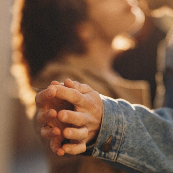 Couple dancing with their hands together