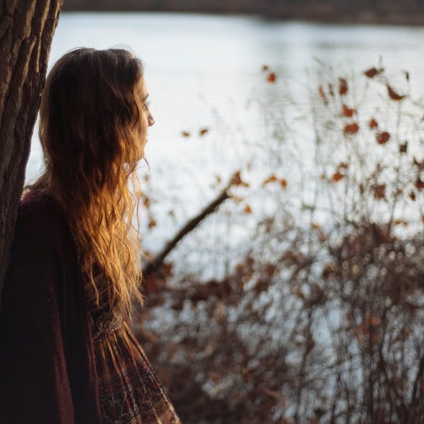 woman staring into distance seeking therapy